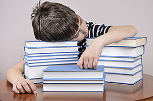 tired boy with book  Medium_300